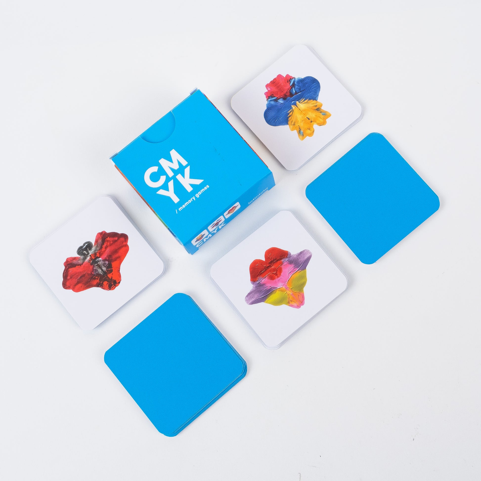 Color swatch cards with CMYK colors on a white background