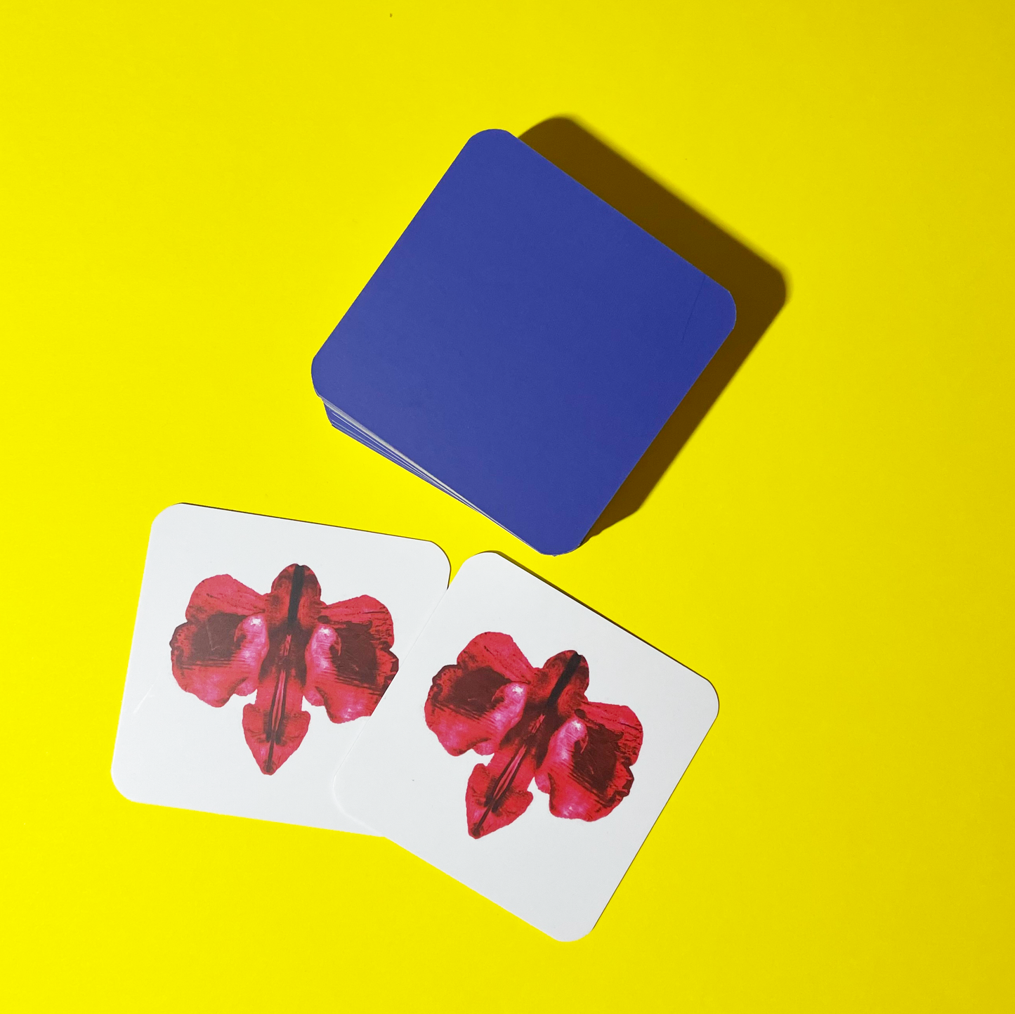 Abstract card game for memory in red. 
